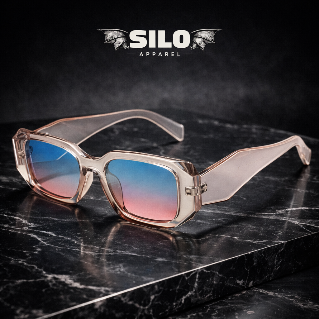 Sunglasses with gradient lenses on a dark marble surface, branded 'Silo Apparel'.