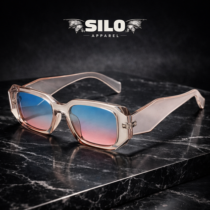Sunglasses with gradient lenses on a dark marble surface, branded 'Silo Apparel'.